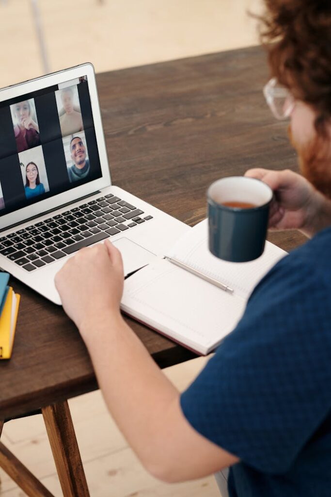 Is e-HRM helping your organization? a man on a virtual meeting with office colleagues 